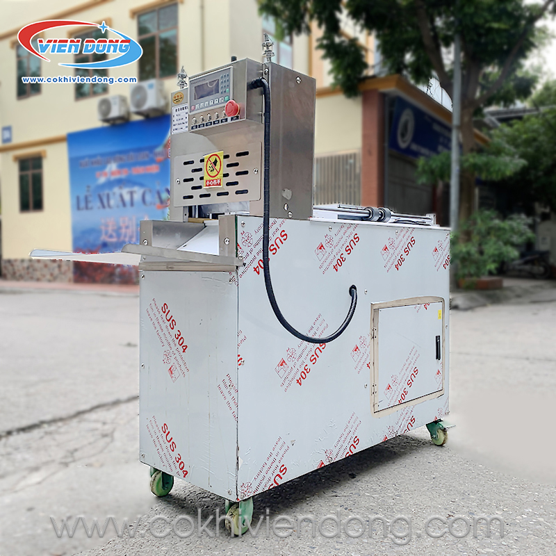 giá máy cắt thịt đông lạnh